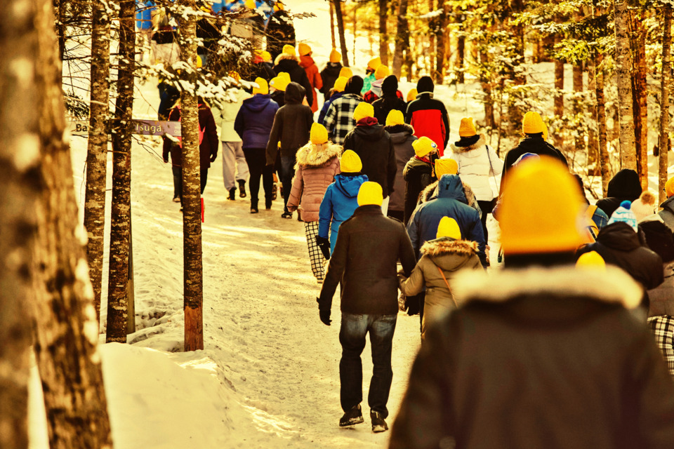 Group of people walking outdoors in winter